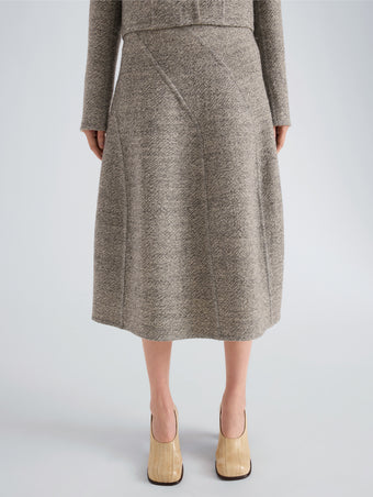 Proenza Schouler Detail image of model wearing Gaelle Skirt in Double Face Melange Outerwear in Ecru Tahini Multi