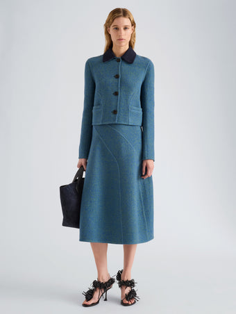 Proenza Schouler Front full length image of model wearing Gaelle Skirt in Double Face Melange Outerwear in Green Midnight Multi