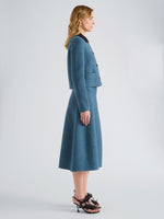 Proenza Schouler Side full length image of model wearing Gaelle Skirt in Double Face Melange Outerwear in Green Midnight Multi