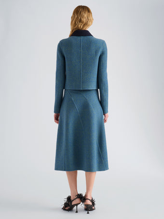 Proenza Schouler Back full length image of model wearing Gaelle Skirt in Double Face Melange Outerwear in Green Midnight Multi