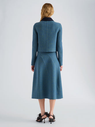 Proenza Schouler Back full length image of model wearing Gaelle Skirt in Double Face Melange Outerwear in Green Midnight Multi