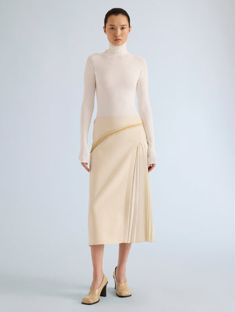 Proenza Schouler Front full length image of model wearing Justine Skirt in Bonded Wool Satin in Off White Tahini