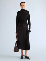 Proenza Schouler Front full length image of model wearing Justine Skirt in Bonded Wool Satin in Black Mink