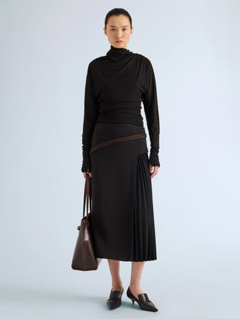 Proenza Schouler Front full length image of model wearing Justine Skirt in Bonded Wool Satin in Black Mink