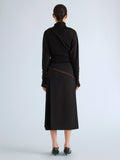 Proenza Schouler Back full length image of model wearing Justine Skirt in Bonded Wool Satin in Black Mink