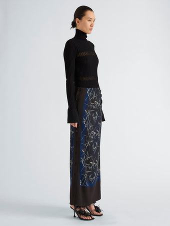 Proenza Schouler Side full length image of model wearing Anais Skirt in Printed Stretch Cady in Ink Multi