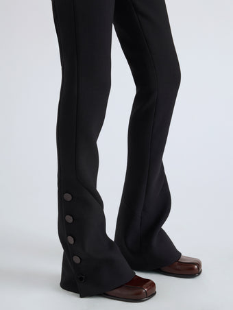 Proenza Schouler Detail image of model wearing Althea Pant in Bi-Stretch Double Wool in Black