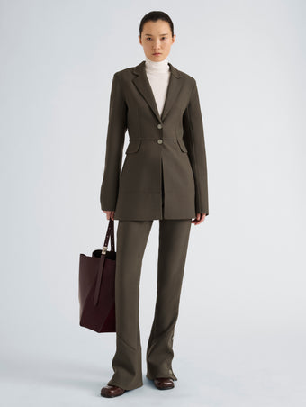 Proenza Schouler Front full length image of model wearing Althea Pant in Bi-Stretch Double Wool in Earth