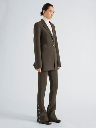 Proenza Schouler Side full length image of model wearing Althea Pant in Bi-Stretch Double Wool in Earth