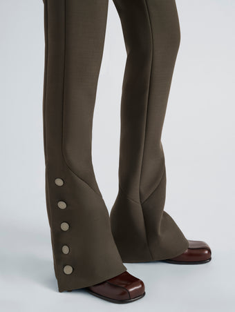 Proenza Schouler Detail image of model wearing Althea Pant in Bi-Stretch Double Wool in Earth