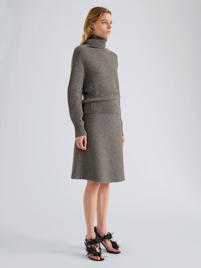 Proenza Schouler Side full length image of model wearing Capucine Skirt in Donegal Knit in Blue Multi