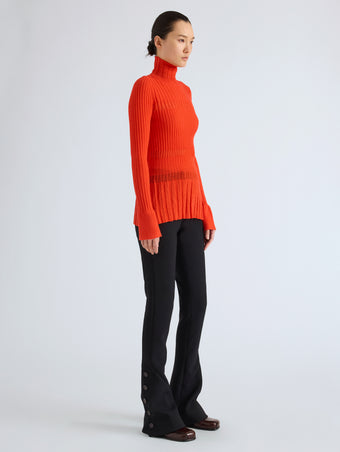 Proenza Schouler Side full length image of model wearing Rosario Top in Textured Merino Wool in Orange