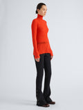 Proenza Schouler Side full length image of model wearing Rosario Top in Textured Merino Wool in Orange