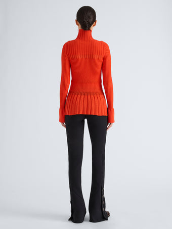 Proenza Schouler Back full length image of model wearing Rosario Top in Textured Merino Wool in Orange