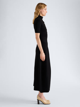 Proenza Schouler Side full length image of model wearing Mathilde Dress in Compact Stretch Viscose in Black