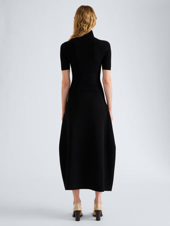 Proenza Schouler Back full length image of model wearing Mathilde Dress in Compact Stretch Viscose in Black