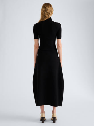 Proenza Schouler Back full length image of model wearing Mathilde Dress in Compact Stretch Viscose in Black