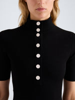 Proenza Schouler Detail image of model wearing Mathilde Dress in Compact Stretch Viscose in Black