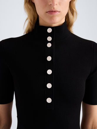 Proenza Schouler Detail image of model wearing Mathilde Dress in Compact Stretch Viscose in Black