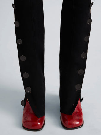 Proenza Schouler Detail image of model wearing Martina Pant in Compact Stretch Viscose in Black