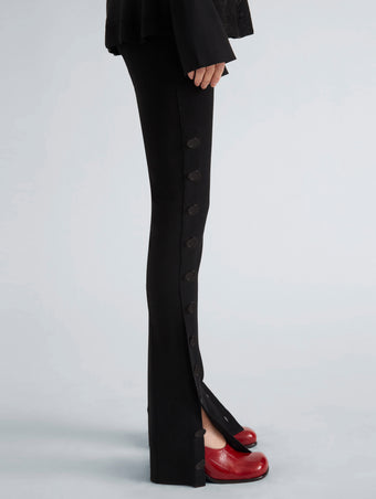 Proenza Schouler Detail image of model wearing Martina Pant in Compact Stretch Viscose in Black