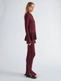 Proenza Schouler Side full length image of model wearing Martina Pant in Compact Stretch Viscose in Amarone