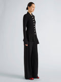 Proenza Schouler Side full length image of model wearing Martina Jacket in Compact Stretch Viscose in Black