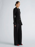 Proenza Schouler Side full length image of model wearing Martina Jacket in Compact Stretch Viscose in Black