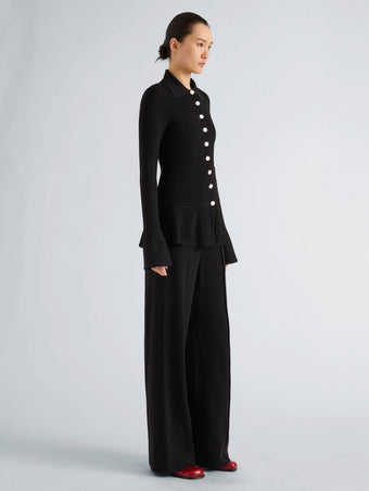 Proenza Schouler Side full length image of model wearing Martina Jacket in Compact Stretch Viscose in Black