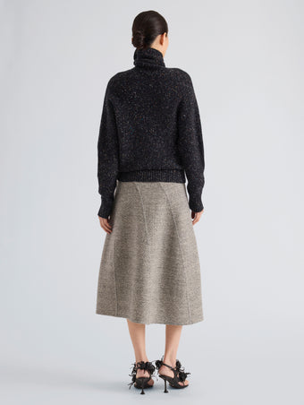 Proenza Schouler Back full length image of model wearing Abie Sweater in Donegal Knit in Black Multi