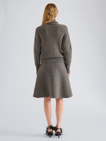 Proenza Schouler Back full length image of model wearing Abie Sweater in Donegal Knit in Blue Multi