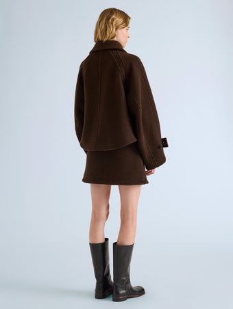 Proenza Schouler Back full length image of model wearing Clarice Jacket in Casentino Wool in Dark Brown