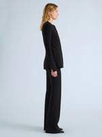 Proenza Schouler Side full length image of model wearing Sonia Jacket in Bi-Stretch Suiting in Black