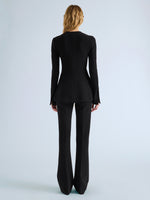 Proenza Schouler Back full length image of model wearing Sonia Jacket in Bi-Stretch Suiting in Black