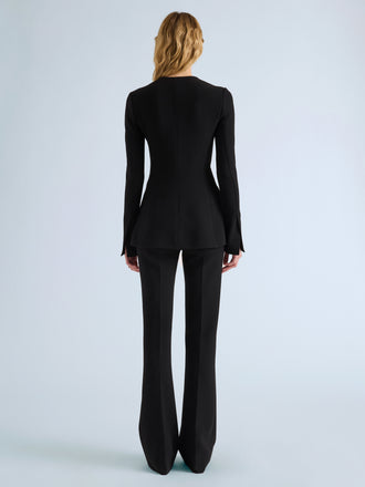Proenza Schouler Back full length image of model wearing Sonia Jacket in Bi-Stretch Suiting in Black