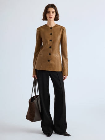 Proenza Schouler Front full length image of model wearing Annemarie Jacket in Nappa Leather in Dark Khaki