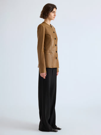 Proenza Schouler Side full length image of model wearing Annemarie Jacket in Nappa Leather in Dark Khaki