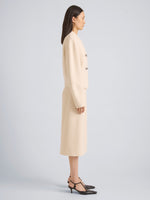 Proenza Schouler Side full length image of model wearing Lorna Jacket in Striated Suiting in Ecru