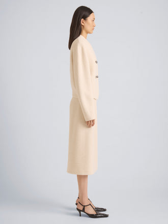 Proenza Schouler Side full length image of model wearing Lorna Jacket in Striated Suiting in Ecru