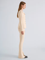 Proenza Schouler Side full length image of model wearing Dara Jacket in Light Bi-Stretch Wool in Ecru