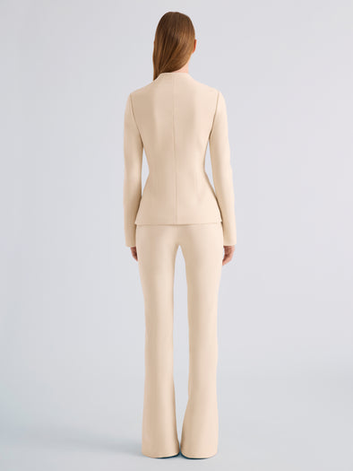 Proenza Schouler Back full length image of model wearing Dara Jacket in Light Bi-Stretch Wool in Ecru