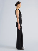 Proenza Schouler Side full length image of model wearing Isaline Dress in Crepe Satin in Black