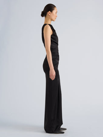 Proenza Schouler Side full length image of model wearing Isaline Dress in Crepe Satin in Black