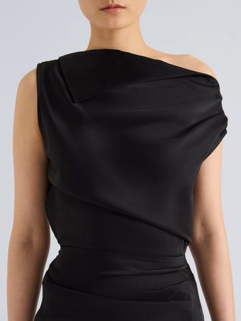 Proenza Schouler Detail image of model wearing Isaline Dress in Crepe Satin in Black