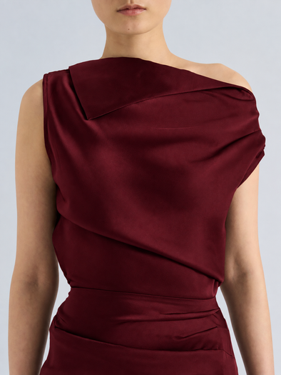 Proenza Schouler Detail image of model wearing Isaline Dress in Crepe Satin in Amarone