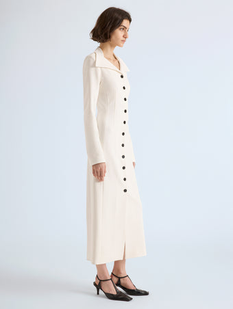 Proenza Schouler Side full length image of model wearing Carmen Dress in Matte Double Crepe in Ecru