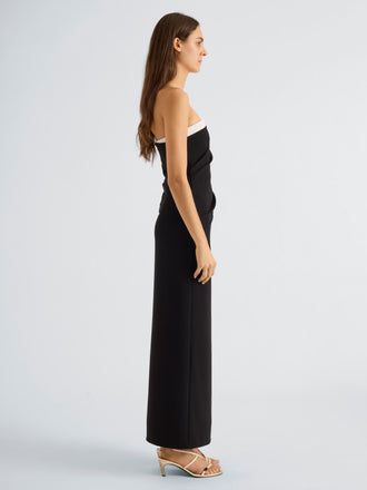 Proenza Schouler Side full length image of model wearing Jackie Dress in Matte Double Crepe in Black Alabaster