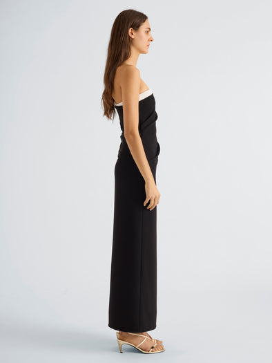 Proenza Schouler Side full length image of model wearing Jackie Dress in Matte Double Crepe in Black Alabaster