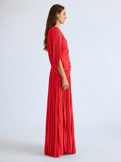 Proenza Schouler Side full length image of model wearing Olympia Gown in Textured Sheer Jersey in Poppy