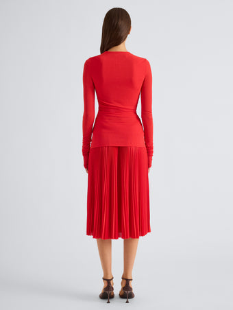 Proenza Schouler Back full length image of model wearing Rina Dress in Textured Sheer Jersey in Poppy